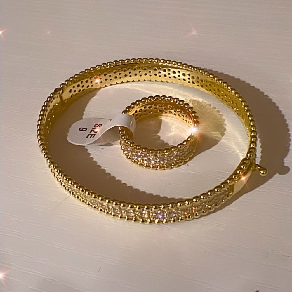 SET BRACELET AND RING IS SIZE 9 NWT